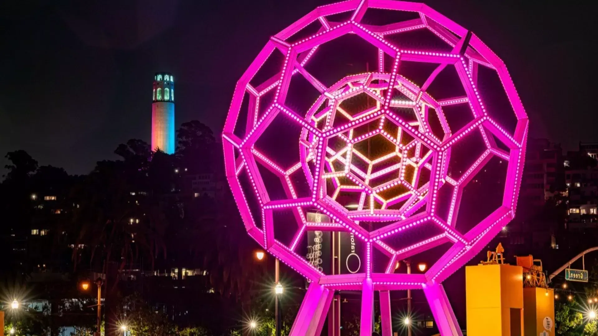 Buckyball shines outside the 探索, with 屁股塔 in the background